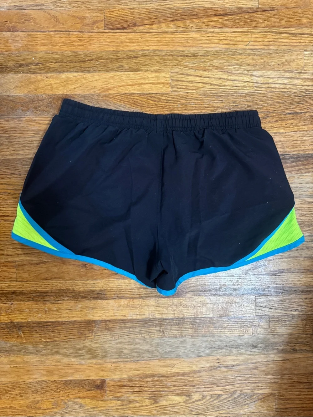 Under Armour Black Athletic Shorts with Blue Trim and Lime Panels